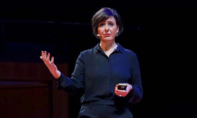 Angela on stage as she delivers a talk at Tedx Manchester in March 2023.