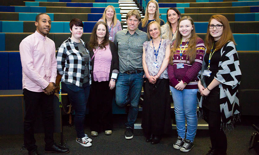 John Bishop with staff and students during a visit to LJMU campus to deliver a talk in 2015