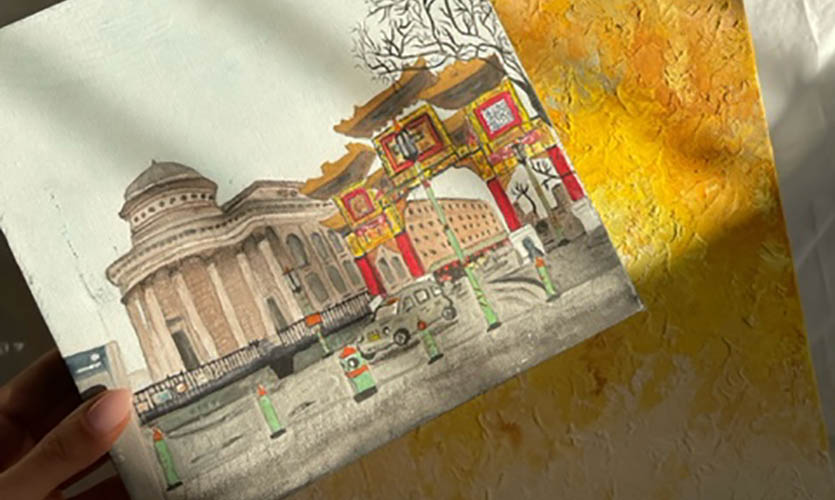 Two art canvases in the sunlight, one features textured brushes of paint in muted yellows and greens and the other a hand painted image of the red and gold gateway that leads to Chinatown in Liverpool