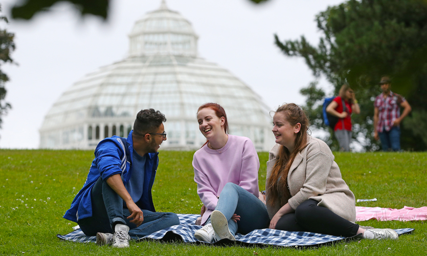 Students having a picnic in Sefton Park, Liverpool