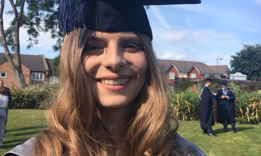 Beth Gribbin in graduation gown and cap
