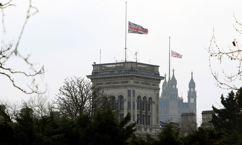 Union flags at half mast on the Foreign Office Building and Palace of Westminster
