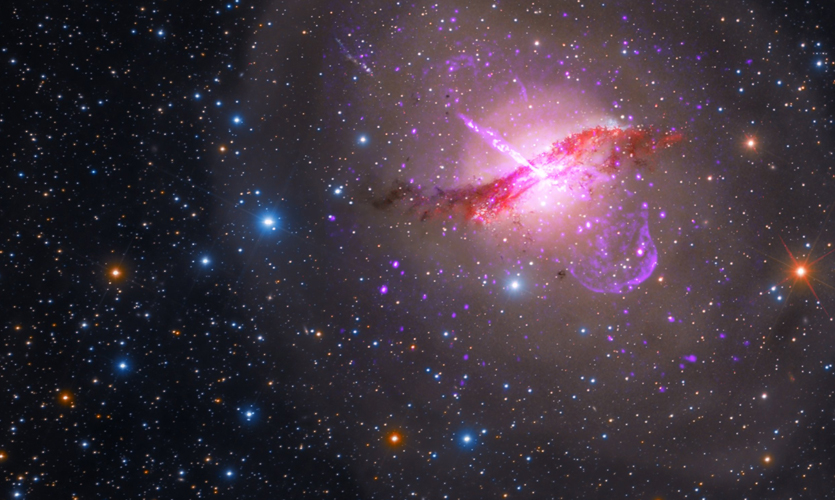 A composite image of the bright pink and red Centaurus A galaxy