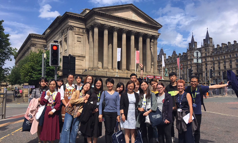 Group of students in front of the neo-classical St George's Hall in Liverpool