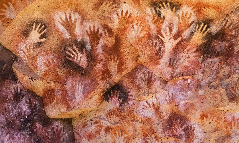 Cave paintings of several handprints