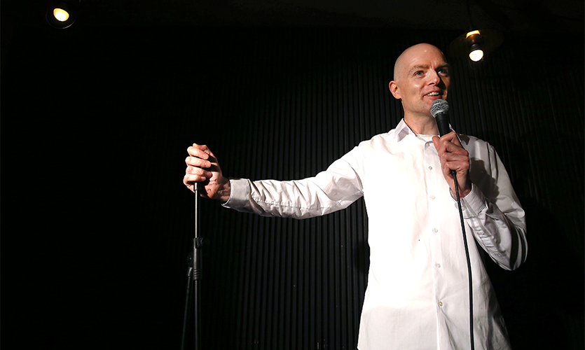 Professor Joe Moran performing on stage