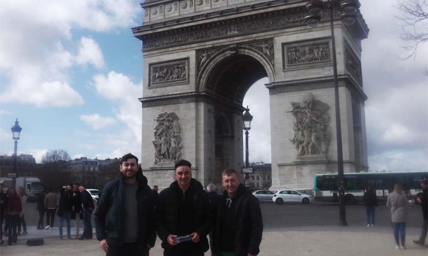 Posing in front of the Ar De Triomphe - Clairefontaine visit