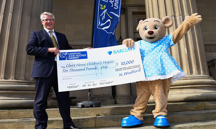 Professor Peter Byers and Claire Bear, the official mascot for the children’s hospice charity.
