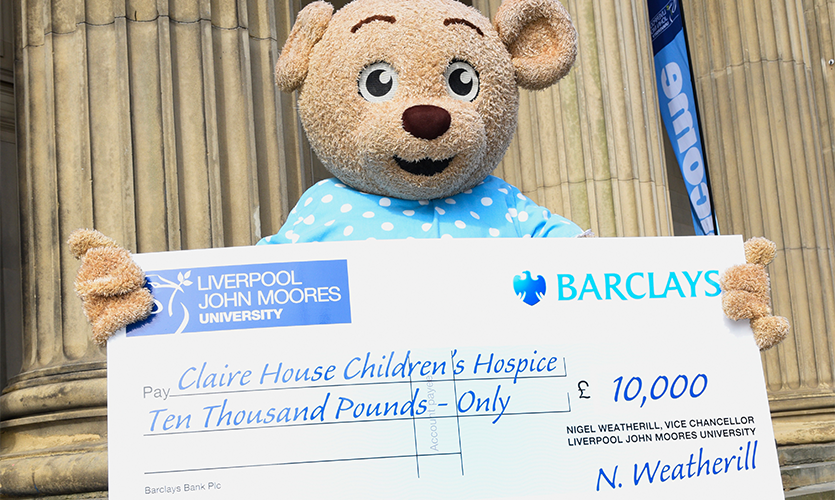 Claire Bear celebrates receiving £10,000 from LJMU for Claire House Children’s Hospice.