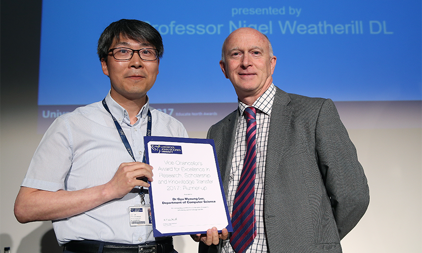 Dr Gyu Myoung Lee receiving his award from LJMU Vice-Chancellor Professor Nigel Weatherill