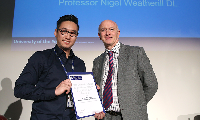 Dr Stephen Tang receiving his award from LJMU Vice-Chancellor Professor Nigel Weatherill