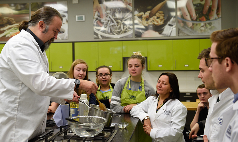 Alan Baxendale shows students how to make sweets