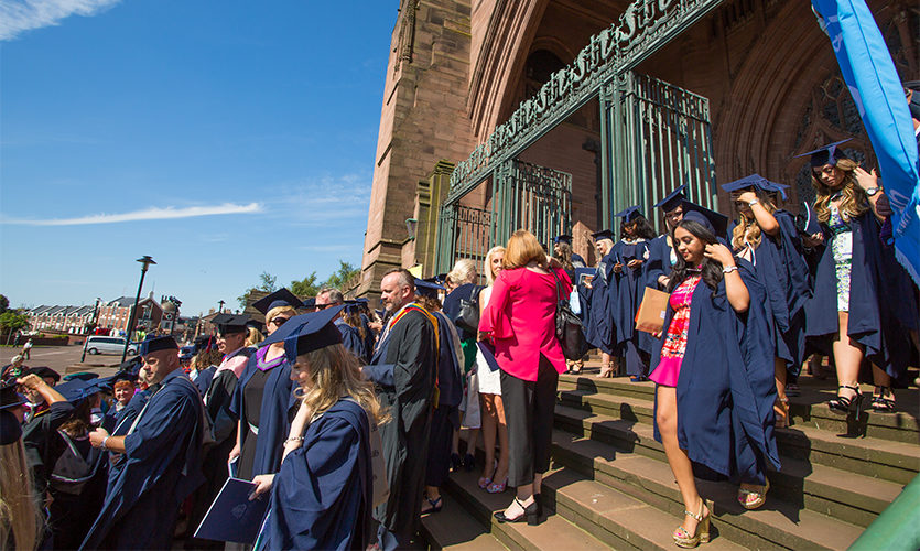 Graduands standing on the Liverpool Cathedral steps