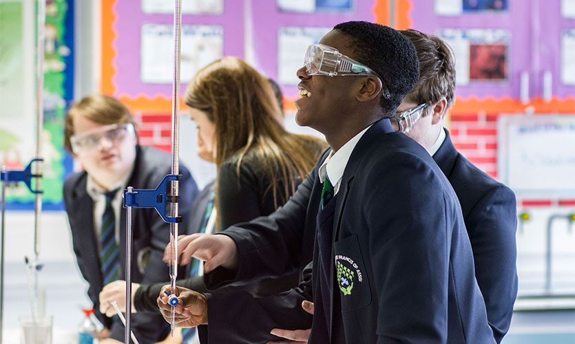 School children performing experiments - chemistry