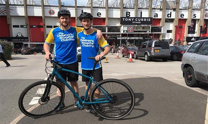 Andrew (right) taking part in charity cycle ride from Liverpool to Skegness