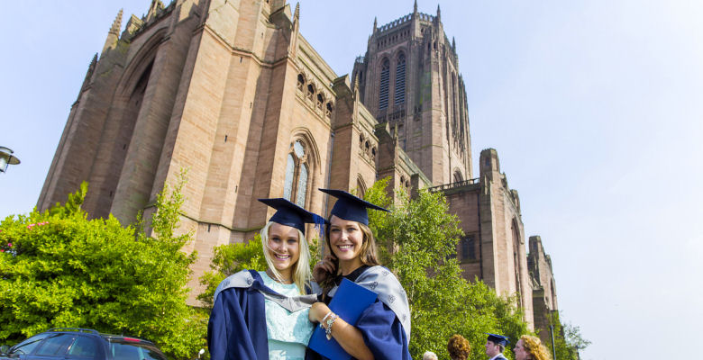 Images of graduates in gowns and mortar boards outside Liverpool Cathedral