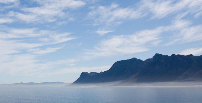 Image of mountains, sea and mist