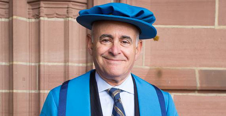 Image of Clement Goldstone in Honorary Fellow hat and gown