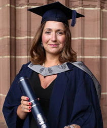 Image of Clare Roberts in cap and gown