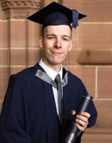 Image of Josh Rotherham in cap and gown
