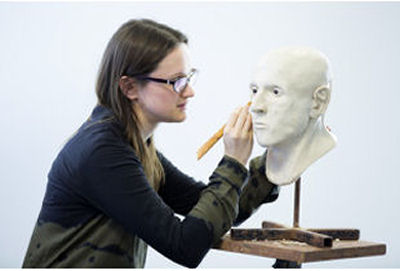 Image of academic working on facial reconstruction
