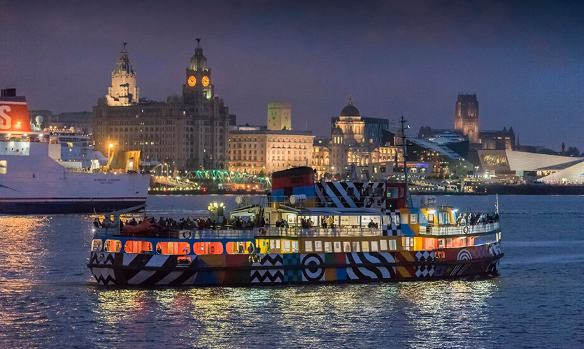 A boat on the Mersey in Liverpool with the Liver Building and such in the background