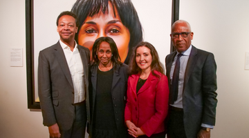 Race equality champion Lord Woolley visits LJMU-curated exhibition of Jamaican art 
