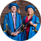 Image of Kevin Fearon and Gillian Miller in their Fellows robes