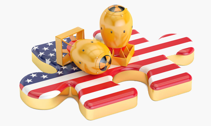 Nuclear bomb models on top of an American flag jigsaw piece