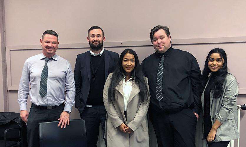 One of the clinic student teams Sarah shadowed with, plus in the middle Michael Fagan of Jackson Lees, volunteer solicitor and an alumnus of our LPC.