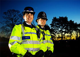 Image of smiling police officers