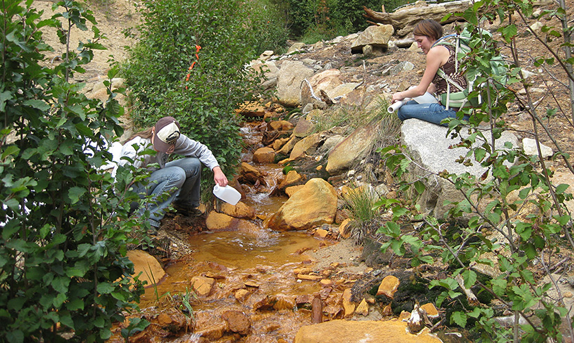 Sampling a polluted river