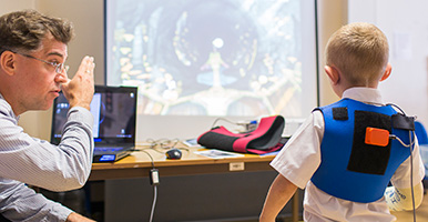 Boy playing virtual game