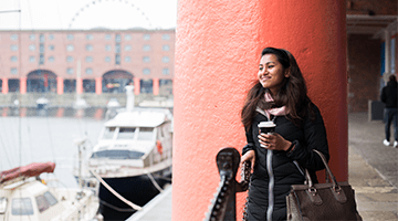 Image of a smiling student at the Albert Dock