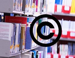 Image of the copyright logo against a background of books on shelves