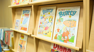 Image of Bunty comic books on a shelf