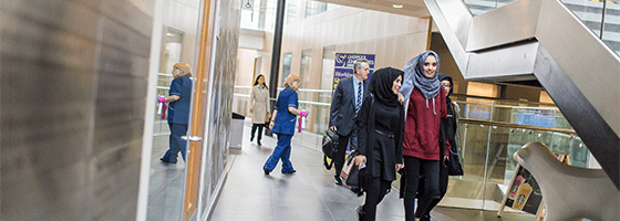 Image of students walking through the Redmonds Building